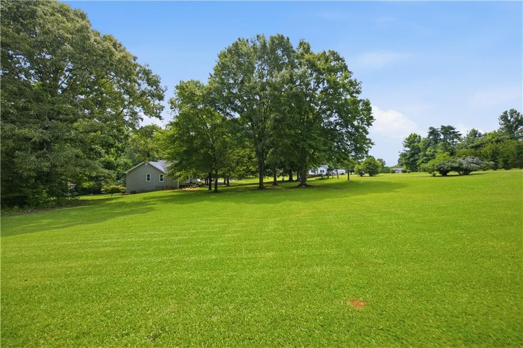 4 bedroom, 3 bathroom single family residence for sale at 1470 Jackson Drive, Cumming, GA 30040 — photo 9