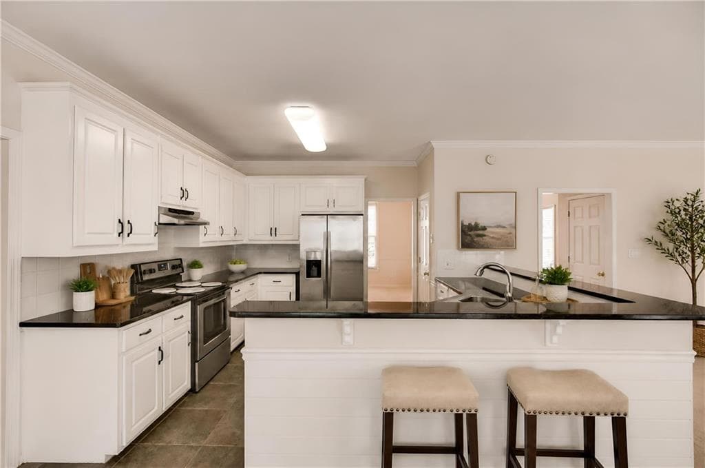 4 bedroom, 3 bathroom, 2,748 sq ft single family residence for sale at 4102 Trotters Way Drive, Snellville, GA 30039 — photo 7