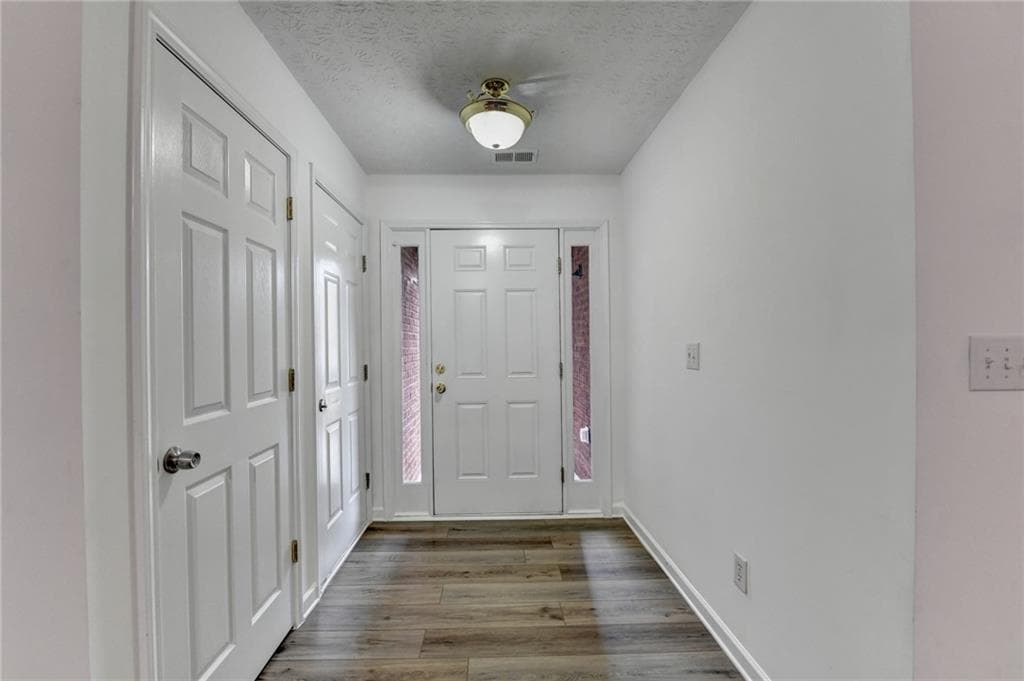 4 bedroom, 2 bathroom, 2,400 sq ft single family residence for sale at 5133 Haverford Run Drive, Lilburn, GA 30047 — photo 3