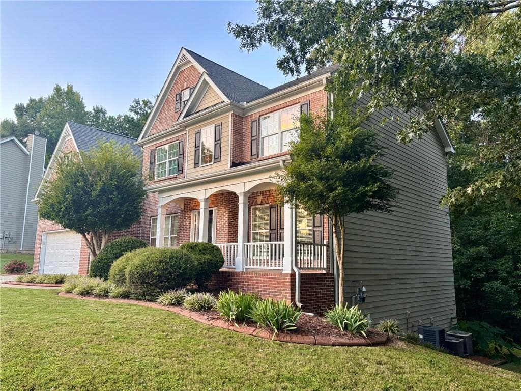 6 bedroom, 4 bathroom, 4,082 sq ft single family residence for sale at 4804 Austin Hills Drive, Suwanee, GA 30024 — photo 3