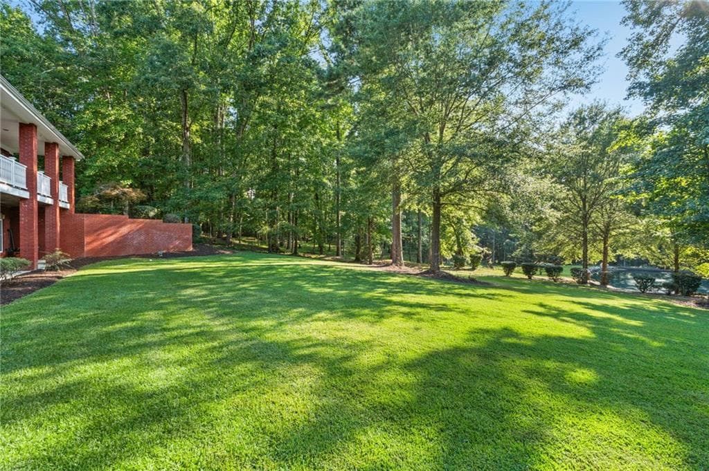 4 bedroom, 5 bathroom, 5,356 sq ft single family residence for sale at 7180 Westray Road, Cumming, GA 30028 — photo 3