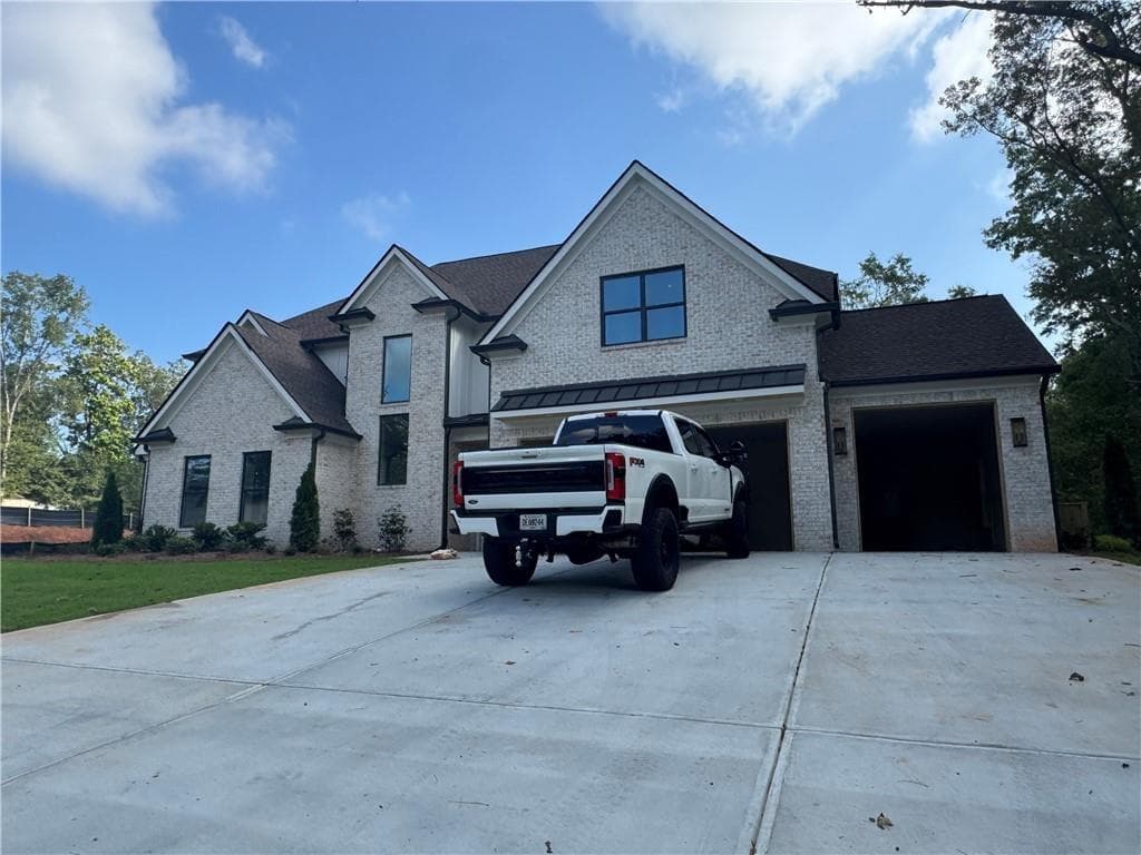 5 bedroom, 6 bathroom, 4,570 sq ft single family residence for sale at 360 Smokey Road, Buford, GA 30518 — photo 2