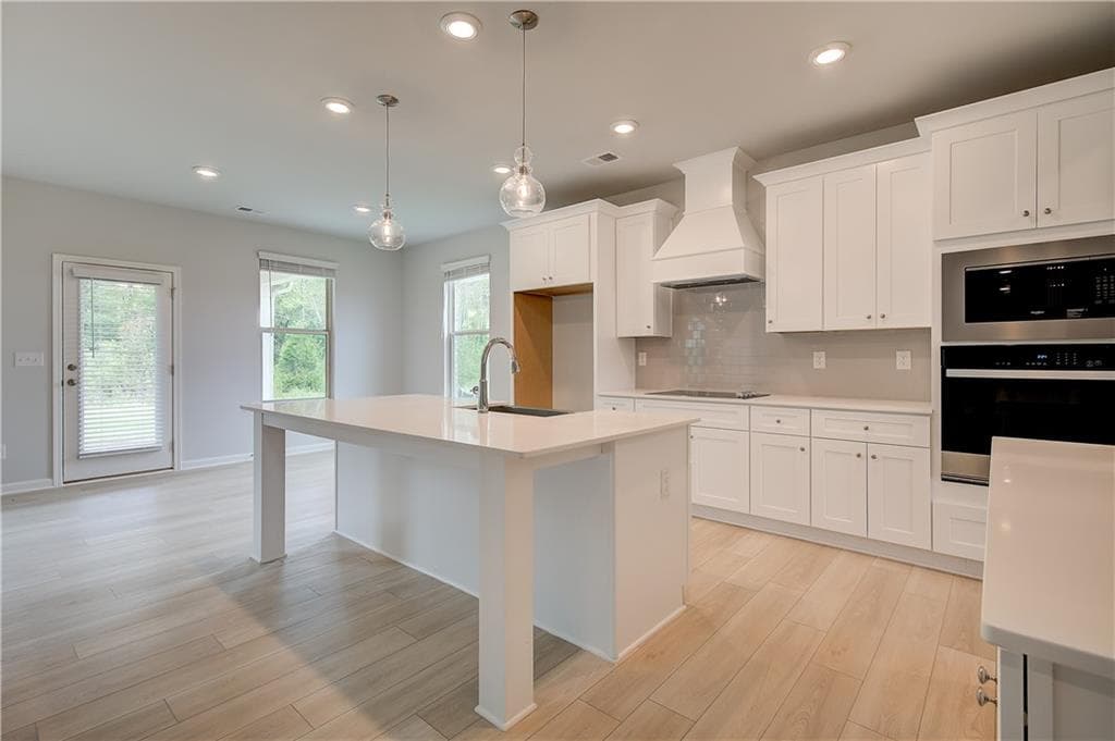 5 bedroom, 5 bathroom, 3,699 sq ft single family residence for sale at 709 Dunlake Way, Locust Grove, GA 30248 — photo 5