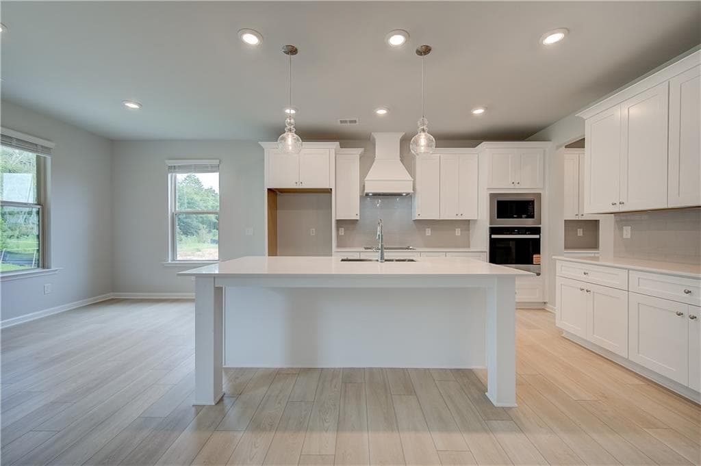 5 bedroom, 5 bathroom, 3,699 sq ft single family residence for sale at 709 Dunlake Way, Locust Grove, GA 30248 — photo 6
