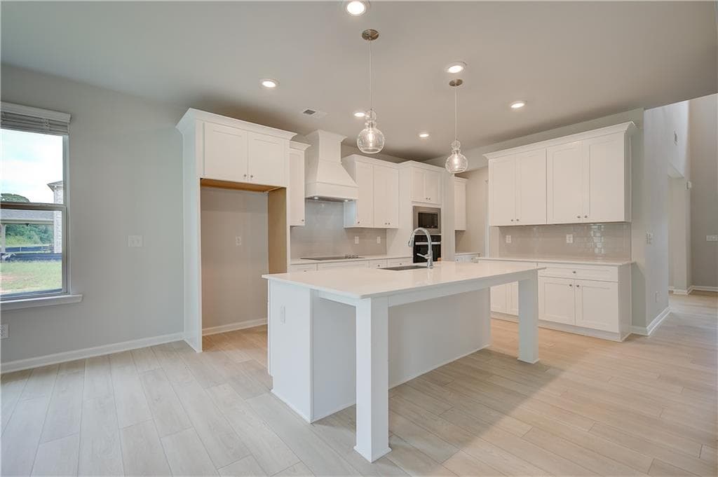 5 bedroom, 5 bathroom, 3,699 sq ft single family residence for sale at 709 Dunlake Way, Locust Grove, GA 30248 — photo 9