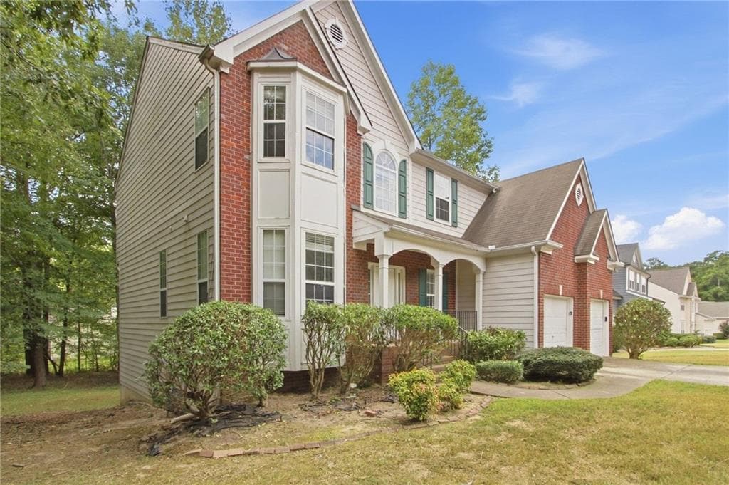 4 bedroom, 4 bathroom, 2,822 sq ft single family residence for sale at 2900 Stonecrest Point, Conyers, GA 30094 — photo 2