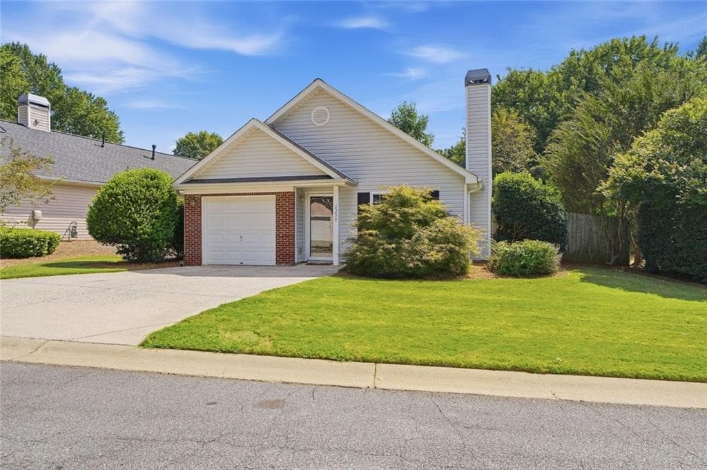 2 bedroom, 2 bathroom, 1,228 sq ft single family residence for sale at 239 Park Place, Woodstock, GA 30189 — photo 1 of 25