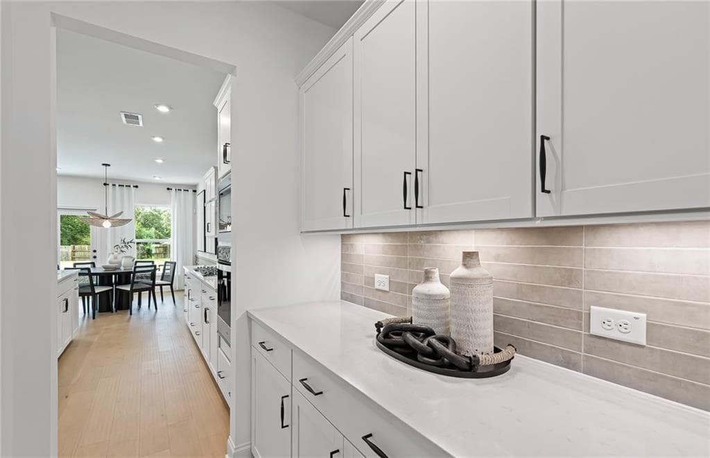 4 bedroom, 3 bathroom, 2,869 sq ft single family residence for sale at 7294 Thistle Down Way, Flowery Branch, GA 30542 — photo 10