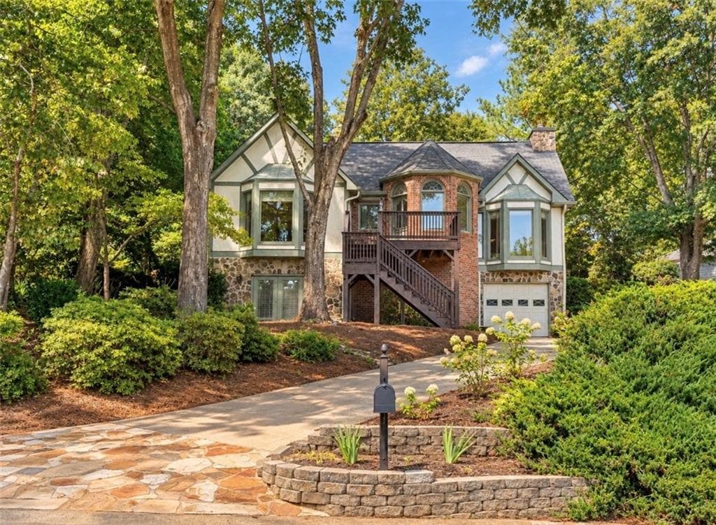 4 bedroom, 4 bathroom, 3,131 sq ft single family residence for sale at 1508 Lake Koinonia Drive, Woodstock, GA 30189