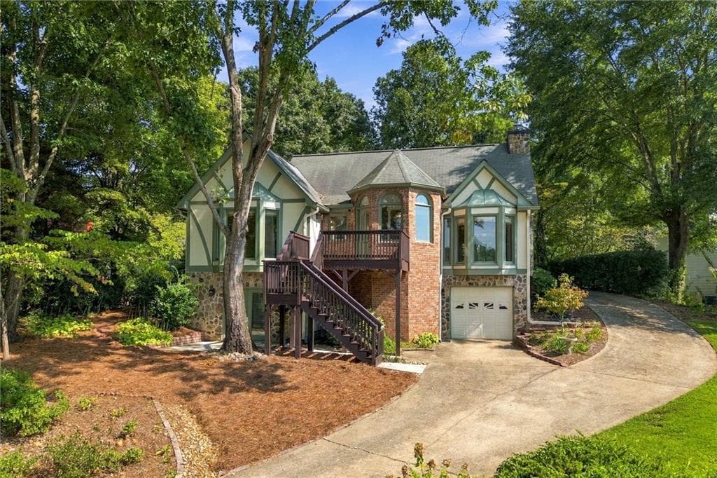 4 bedroom, 4 bathroom, 3,131 sq ft single family residence for sale at 1508 Lake Koinonia Drive, Woodstock, GA 30189 — photo 2