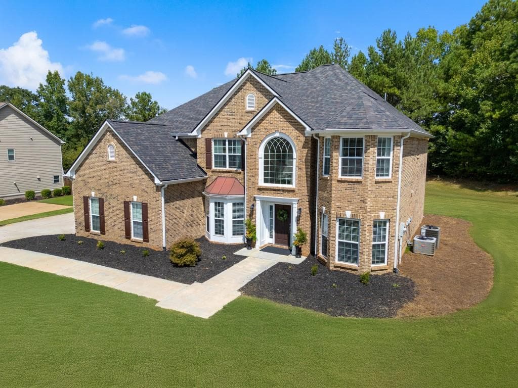 5 bedroom, 4 bathroom, 3,633 sq ft single family residence for sale at 1316 Darian Lane, Locust Grove, GA 30248 — photo 2
