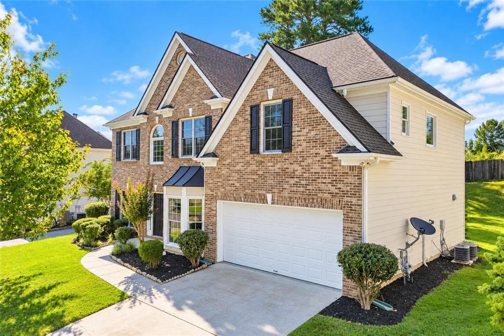 5 bedroom, 3 bathroom, 2,749 sq ft single family residence for sale at 1933 Arbor Springs Way, Buford, GA 30519 — photo 2
