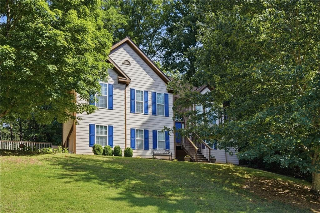 4 bedroom, 3 bathroom, 2,302 sq ft single family residence for sale at 3990 F A A Road, Cumming, GA 30041 — photo 2