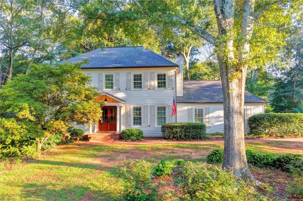 4 bedroom, 3 bathroom, 2,024 sq ft single family residence under contract at 3852 Ivey Lane, Lilburn, GA 30047 — photo 2