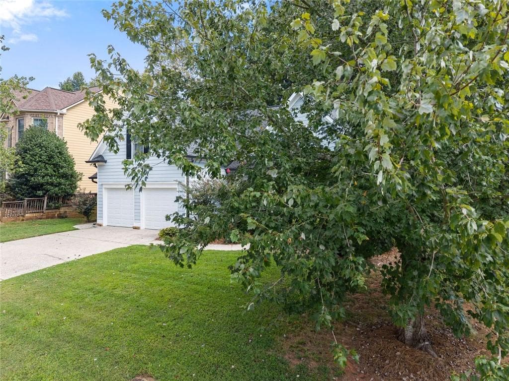 4 bedroom, 3 bathroom, 2,259 sq ft single family residence for sale at 6985 W Mountain Crossing, Cumming, GA 30041 — photo 5