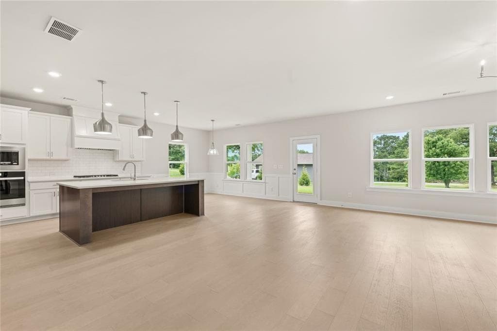 5 bedroom, 5 bathroom, 3,027 sq ft single family residence for sale at 8125 Wallace Tatum Road, Cumming, GA 30028 — photo 5