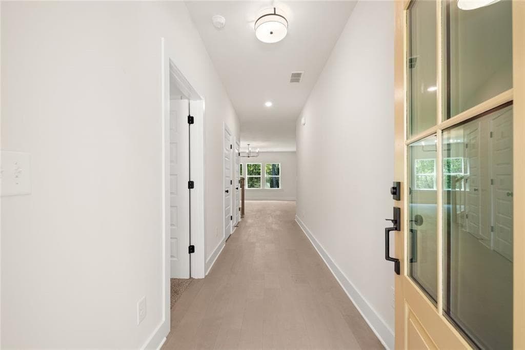 5 bedroom, 5 bathroom, 3,145 sq ft single family residence for sale at 8110 Lennox Lane, Cumming, GA 30028 — photo 6