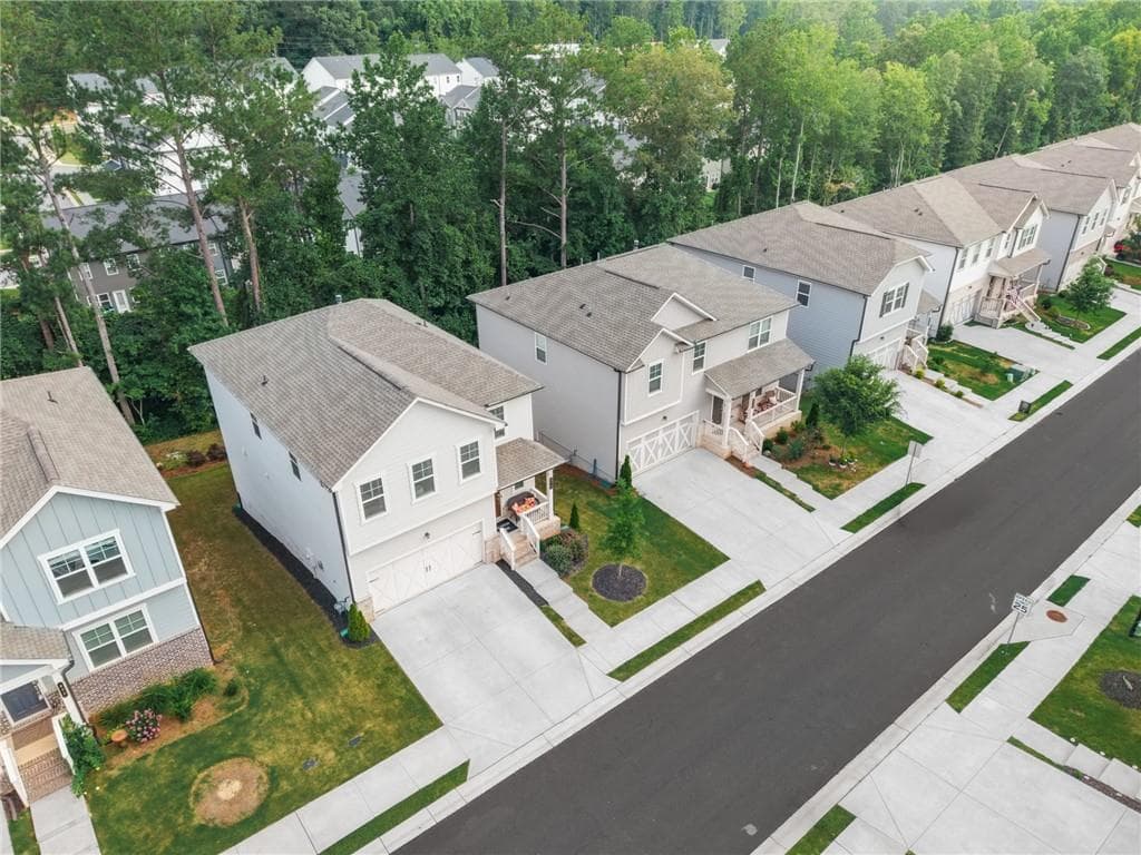 5 bedroom, 3 bathroom, 2,169 sq ft single family residence for sale at 672 Groover Street, Ball Ground, GA 30107 — photo 3