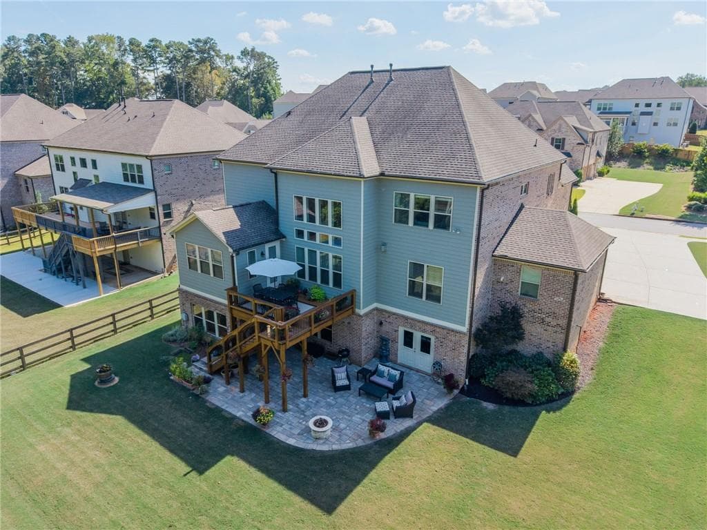5 bedroom, 5 bathroom, 4,195 sq ft single family residence for sale at 3825 Lakehurst Way, Cumming, GA 30040 — photo 2