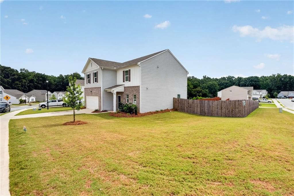4 bedroom, 3 bathroom, 2,232 sq ft single family residence for sale at 240 River Branch Way, Hoschton, GA 30548 — photo 2
