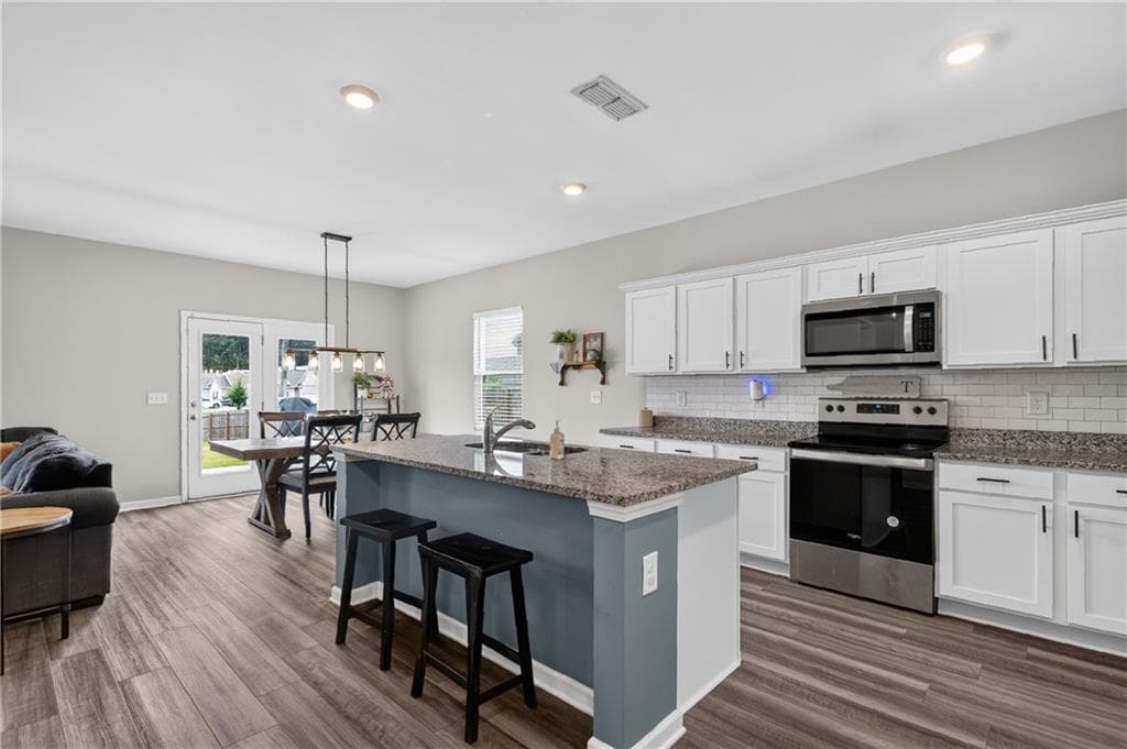 4 bedroom, 3 bathroom, 2,232 sq ft single family residence for sale at 240 River Branch Way, Hoschton, GA 30548 — photo 6