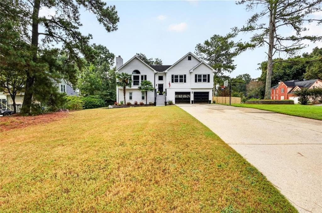 6 bedroom, 3 bathroom, 3,760 sq ft single family residence for sale at 222 Gates Mill Drive, Lawrenceville, GA 30045 — photo 1 of 36