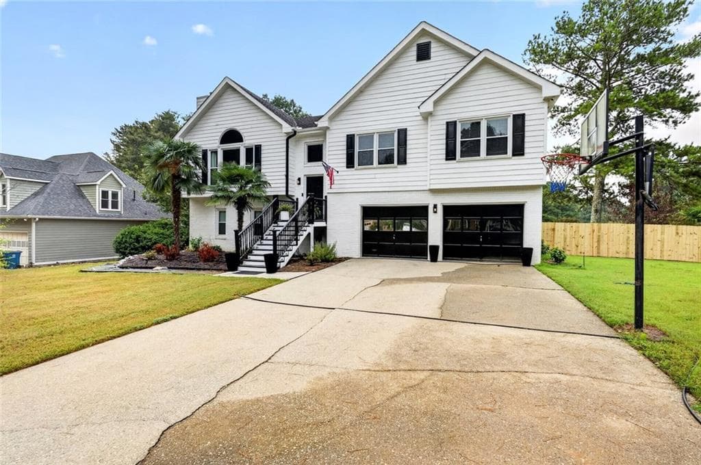 6 bedroom, 3 bathroom, 3,760 sq ft single family residence for sale at 222 Gates Mill Drive, Lawrenceville, GA 30045 — photo 2