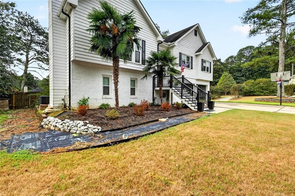 6 bedroom, 3 bathroom, 3,760 sq ft single family residence for sale at 222 Gates Mill Drive, Lawrenceville, GA 30045 — photo 3