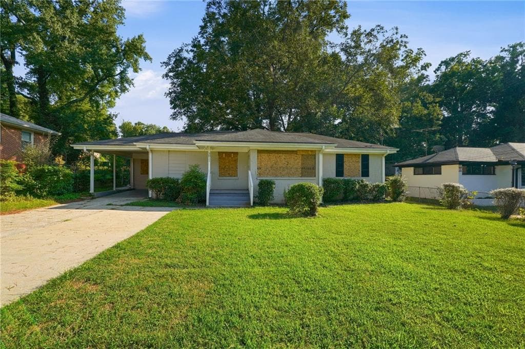 4 bedroom, 1 bathroom, 1,220 sq ft single family residence for sale at 3011 Belvedere Lane, Decatur, GA 30032 — photo 1 of 30