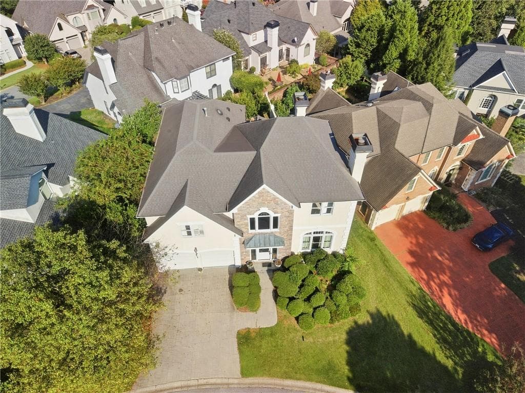 4 bedroom, 5 bathroom, 5,965 sq ft single family residence for sale at 4479 Chattahoochee Plantation Drive, Marietta, GA 30067 — photo 2