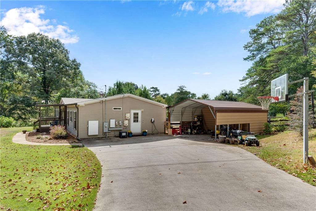 4 bedroom, 2 bathroom, 2,052 sq ft single family residence for sale at 4353 Flatbottom Road, Ball Ground, GA 30107 — photo 3