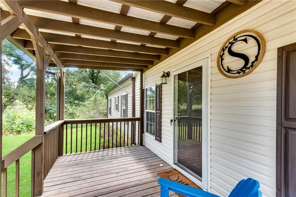 4 bedroom, 2 bathroom, 2,052 sq ft single family residence for sale at 4353 Flatbottom Road, Ball Ground, GA 30107 — photo 5