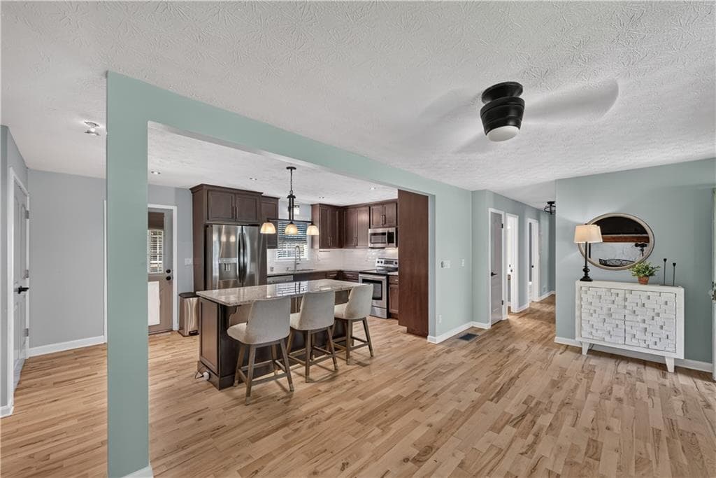 3 bedroom, 2 bathroom, 1,208 sq ft single family residence for sale at 1341 Prospectors Drive, Lawrenceville, GA 30043 — photo 4