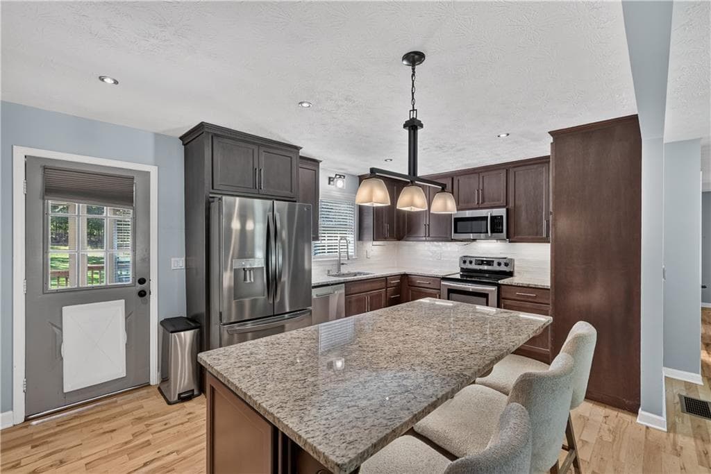 3 bedroom, 2 bathroom, 1,208 sq ft single family residence for sale at 1341 Prospectors Drive, Lawrenceville, GA 30043 — photo 5
