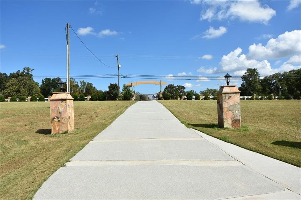 4 bedroom, 4 bathroom, 3,952 sq ft single family residence for sale at 3600 Thompson Mill Road, Buford, GA 30519 — photo 3