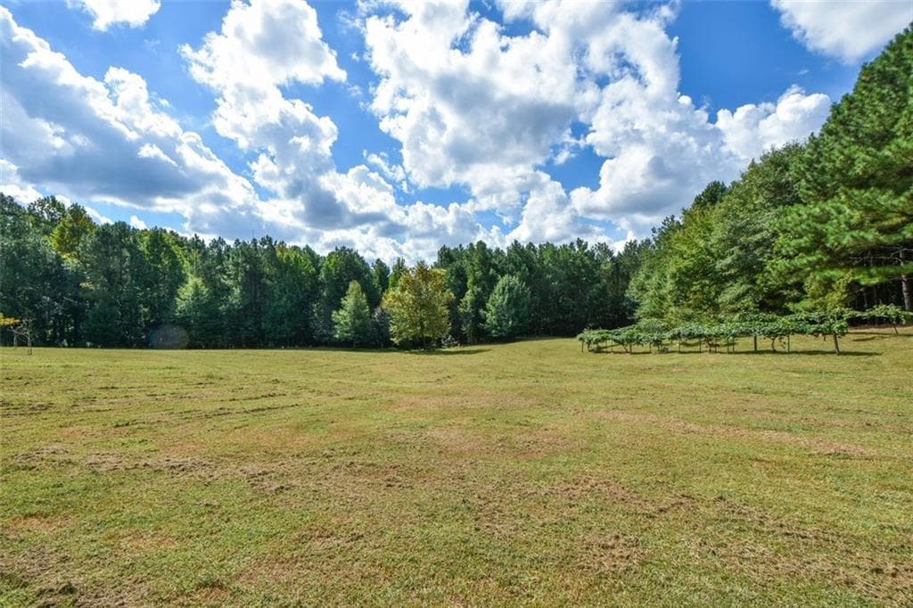 4 bedroom, 4 bathroom single family residence for sale at 3616 Thompson Mill Road, Buford, GA 30519 — photo 4