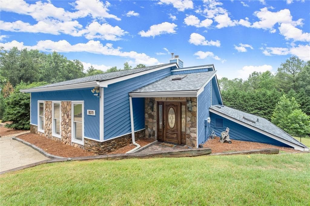 4 bedroom, 4 bathroom, 3,928 sq ft single family residence for sale at 1071 Powell Wright Road, Marietta, GA 30066 — photo 2