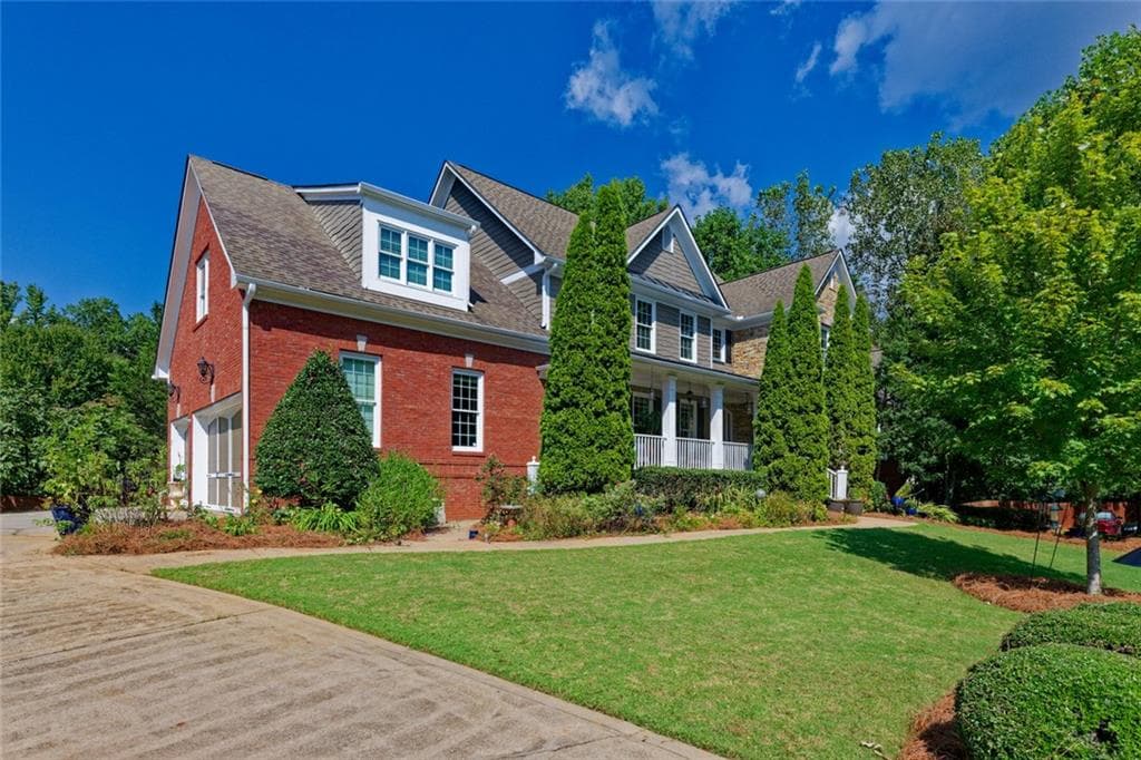 6 bedroom, 6 bathroom, 6,438 sq ft single family residence for sale at 2721 Rustling Pines Court, Marietta, GA 30062 — photo 2
