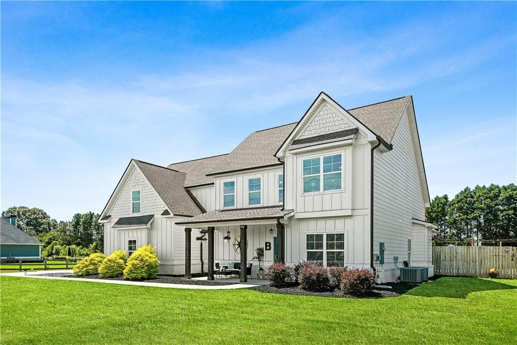 5 bedroom, 4 bathroom, 4,788 sq ft single family residence for sale at 1538 E Lake Road, Mcdonough, GA 30252