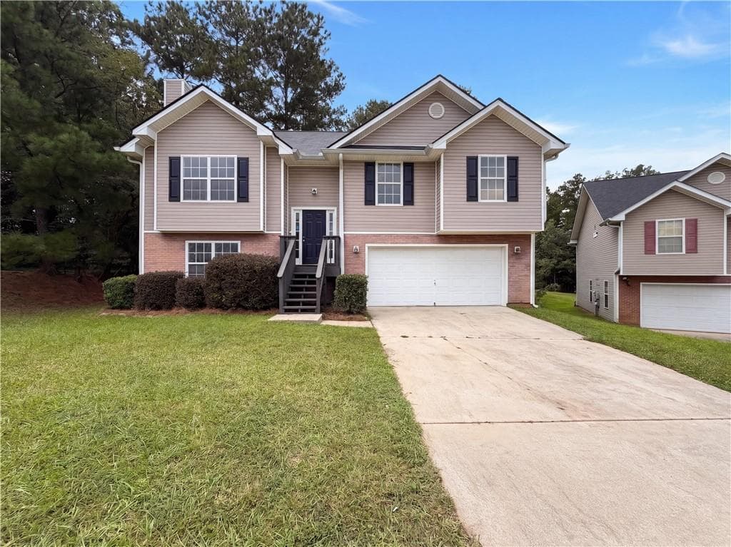 3 bedroom, 2 bathroom, 1,488 sq ft single family residence for sale at 3936 Kimberlyn Court, Rex, GA 30273 — photo 2