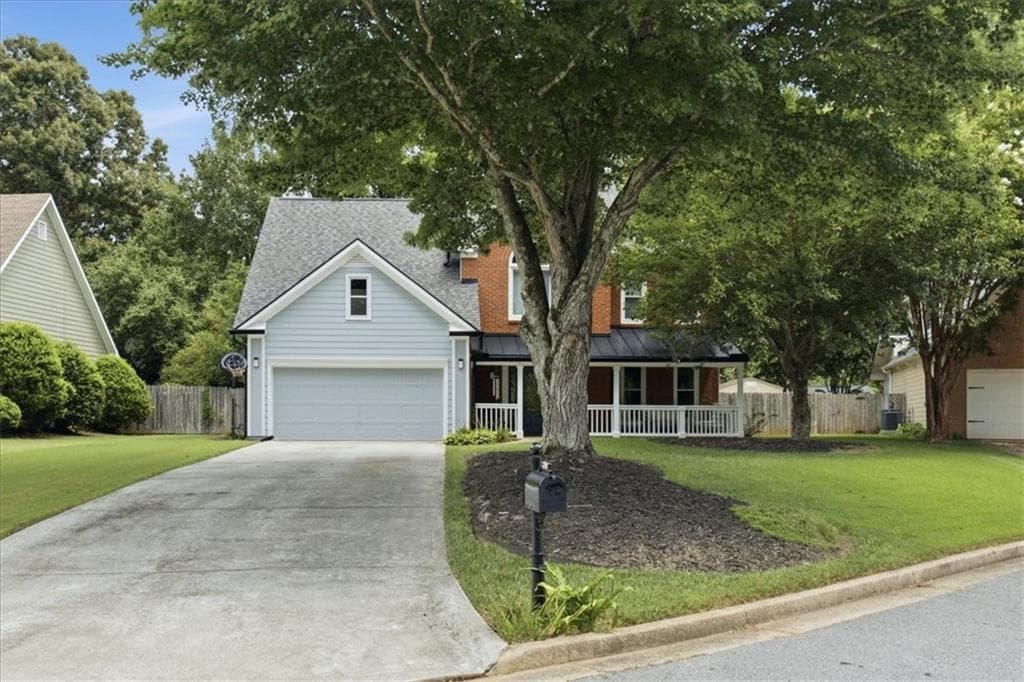 4 bedroom, 3 bathroom, 2,240 sq ft single family residence for sale at 11160 Brookhollow Trail, Johns Creek, GA 30022 — photo 2