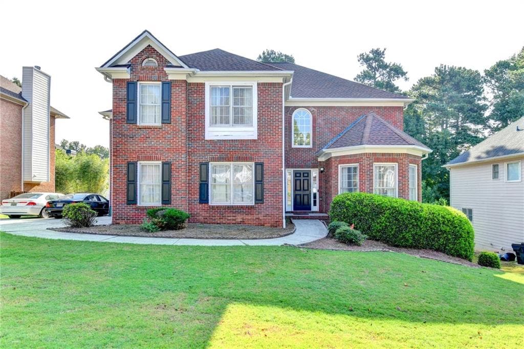 7 bedroom, 6 bathroom, 5,691 sq ft single family residence for sale at 2019 Sugar Springs Drive, Lawrenceville, GA 30043