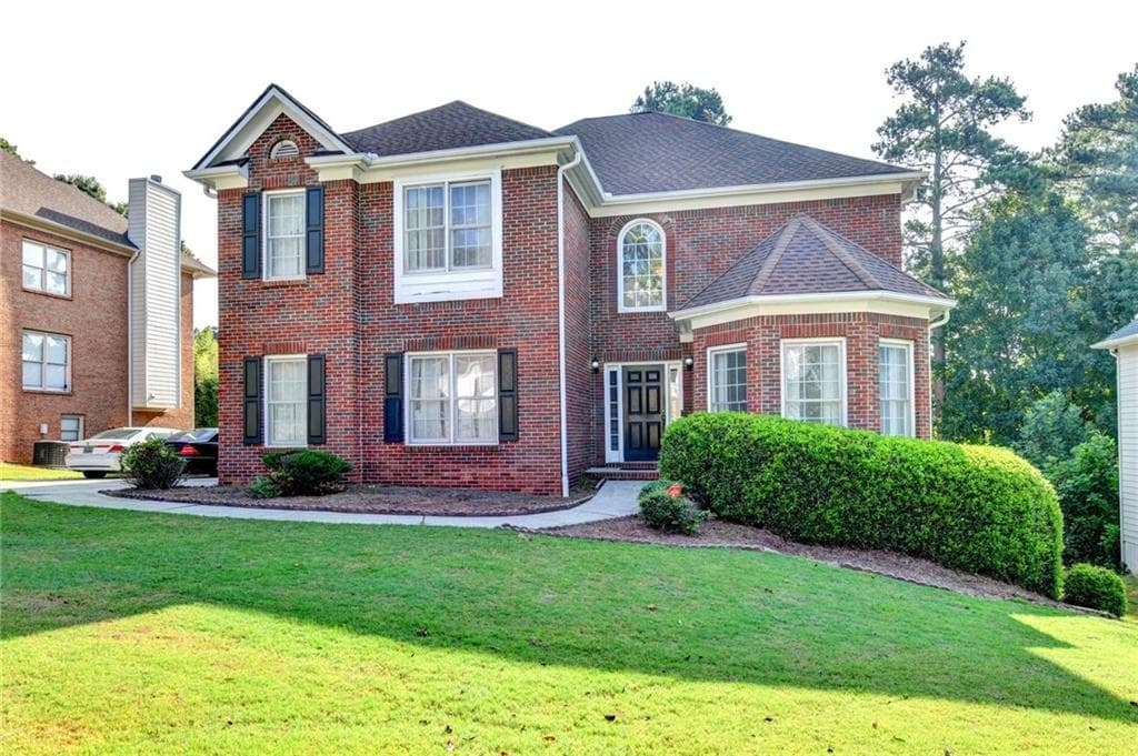7 bedroom, 6 bathroom, 5,691 sq ft single family residence for sale at 2019 Sugar Springs Drive, Lawrenceville, GA 30043 — photo 2