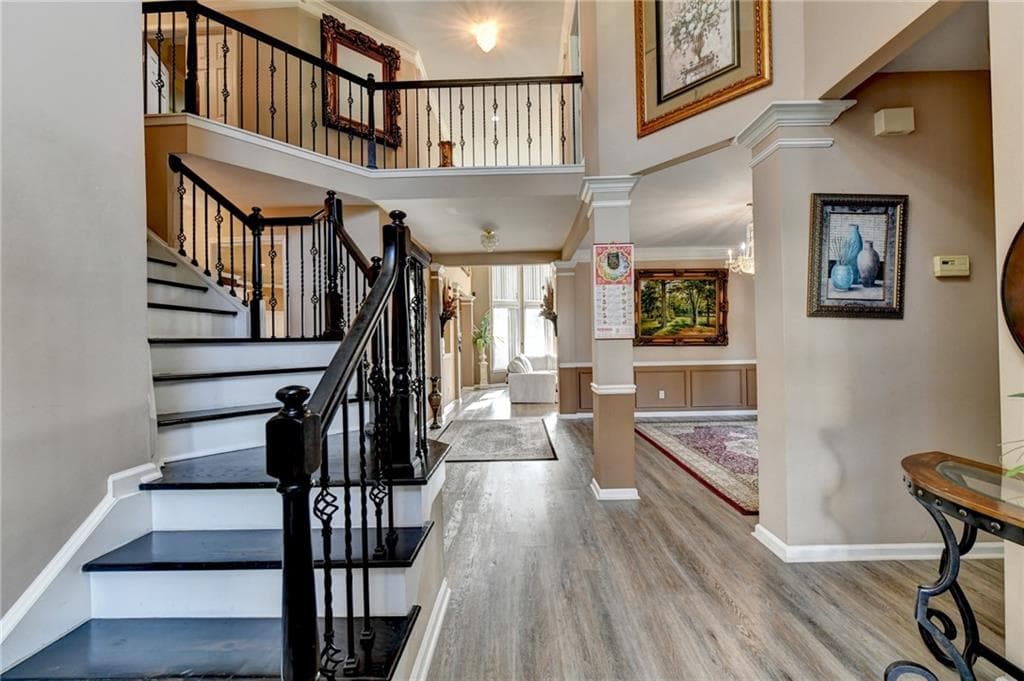 7 bedroom, 6 bathroom, 5,691 sq ft single family residence for sale at 2019 Sugar Springs Drive, Lawrenceville, GA 30043 — photo 3