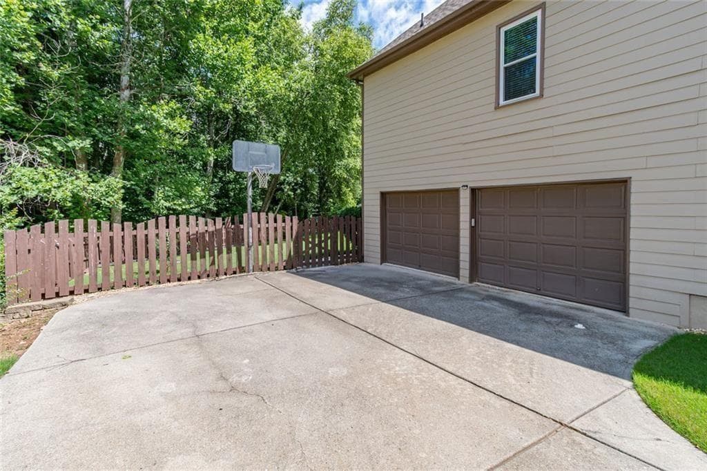 5 bedroom, 4 bathroom, 5,015 sq ft single family residence for sale at 2914 Volland Grove Trail, Lawrenceville, GA 30043 — photo 4