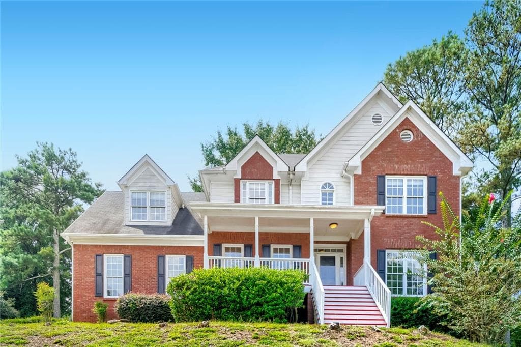 4 bedroom, 4 bathroom, 2,329 sq ft single family residence for sale at 8100 Greens Mill Way, Loganville, GA 30052 — photo 2