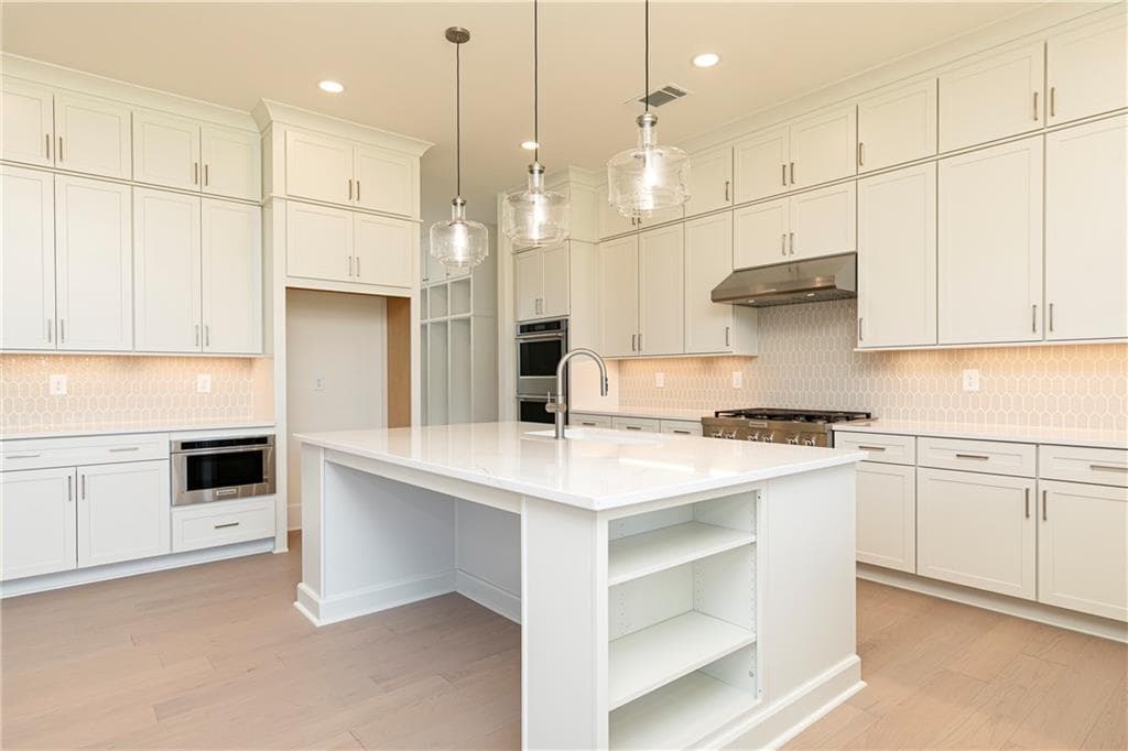 5 bedroom, 4 bathroom, 3,808 sq ft single family residence for sale at 3810 Mustang Way, Cumming, GA 30040 — photo 6