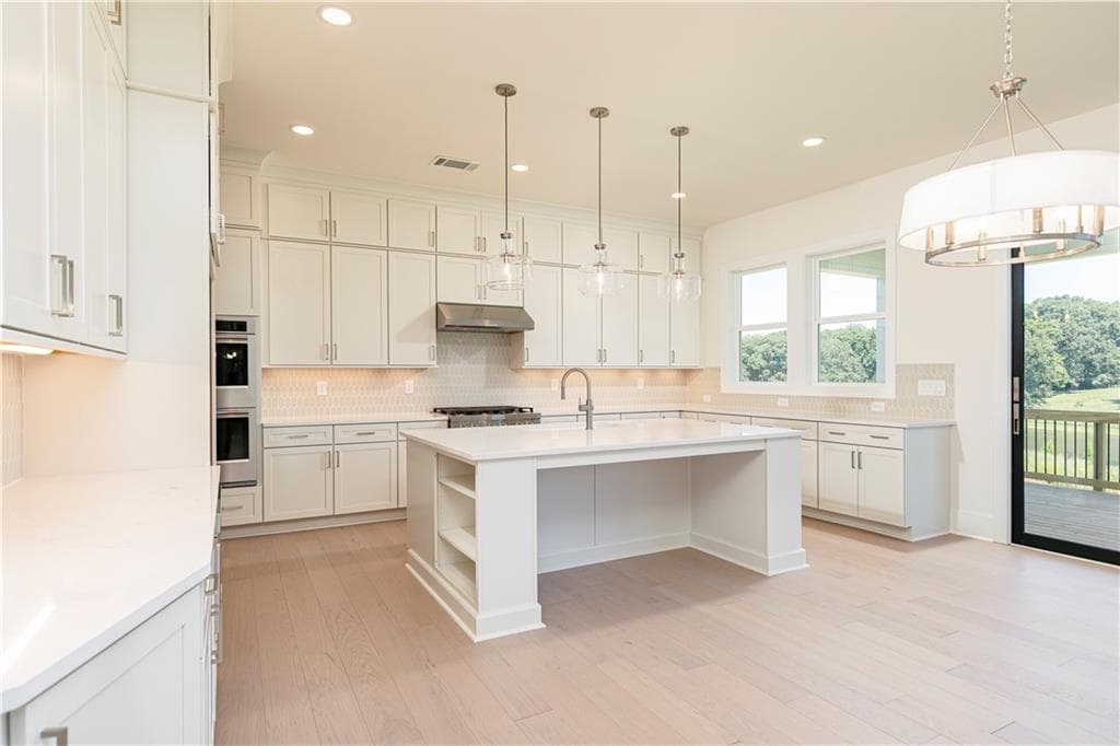 5 bedroom, 4 bathroom, 3,808 sq ft single family residence for sale at 3810 Mustang Way, Cumming, GA 30040 — photo 7