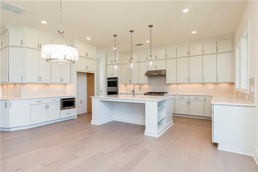 5 bedroom, 4 bathroom, 3,808 sq ft single family residence for sale at 3810 Mustang Way, Cumming, GA 30040 — photo 9