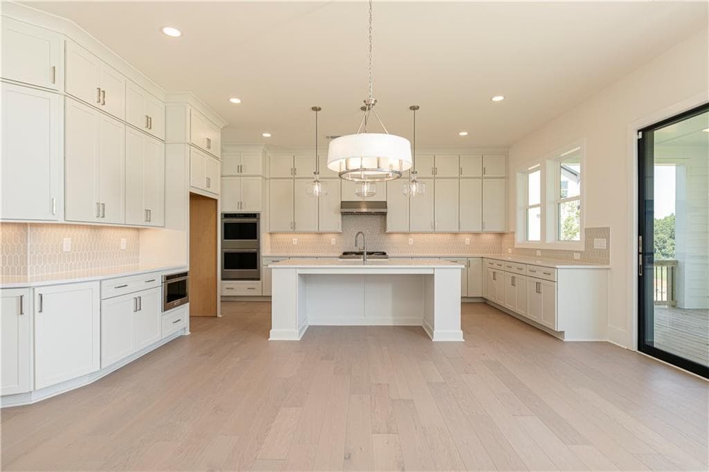 5 bedroom, 4 bathroom, 3,808 sq ft single family residence for sale at 3810 Mustang Way, Cumming, GA 30040 — photo 10